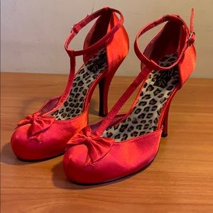 Red satin PinUp t-strap heels.